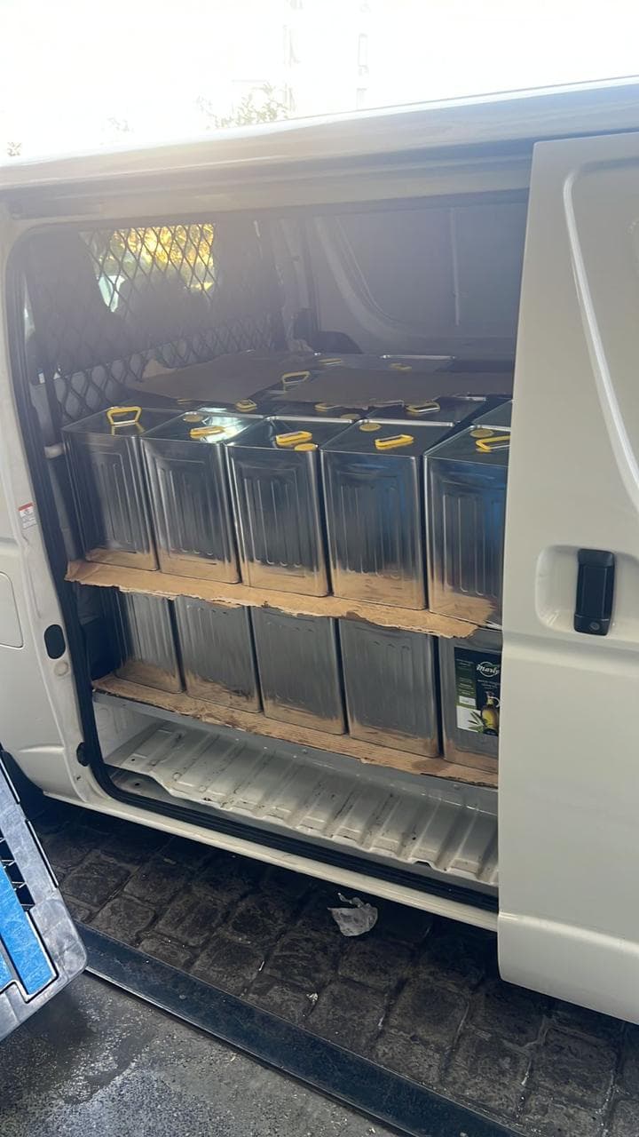 Bulk olive oil tins ready for delivery